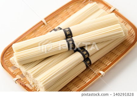 Hand-stretched somen noodles served on a bamboo sieve Hand-stretched somen noodles served on a bamboo sieve 140291828