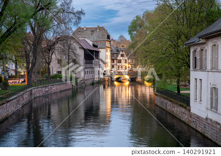 Golden Hour Canal Illuminated Bridge and Historic Mill Golden Hour Canal Illuminated Bridge and Historic Mill 140291921