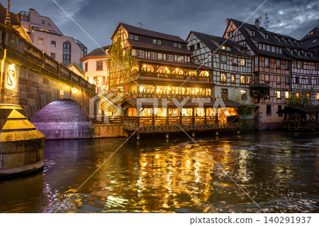 Dusk Riverside Illuminated Timbered Houses Golden Light Dusk Riverside Illuminated Timbered Houses Golden Light 140291937