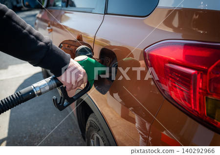 Refueling Car at Gas Station Fuel Pump 140292966