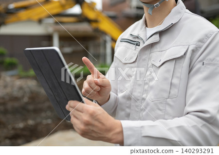 Workers working in the field Workers working in the field 140293291