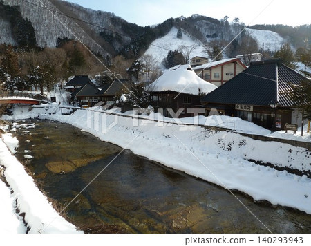 Winter in Yunishigawa Onsen town (Nikko City, Tochigi Prefecture) - Yunishigawa River and mini snow huts 140293943