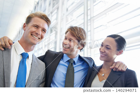 Business people, together and confident in cooperation, embrace and pride in partnership. Happy coworkers, teamwork and collaboration or support in workplace, smiling and hugging for solidarity Business people, together and confident in cooperation, embrace and pride in partnership. Happy coworkers, teamwork and collaboration or support in workplace, smiling and hugging for solidarity 140294071