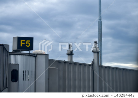 Airport scene with the Jet bridge. Waiting to aboard. Travel and transportation scene. Airport scene with the Jet bridge. Waiting to aboard. Travel and transportation scene. 140294442