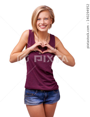 Happy woman, portrait and heart hands with love in care, support or romance on a white studio background. Young female person, blonde or model with smile, like emoji or shape sign of romantic gesture Happy woman, portrait and heart hands with love in care, support or romance on a white studio background. Young female person, blonde or model with smile, like emoji or shape sign of romantic gesture 140294952