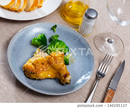 Fried chicken fillet served on plate with tasty broccoli. Hearty healthy lunch Fried chicken fillet served on plate with tasty broccoli. Hearty healthy lunch 140295137