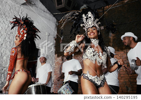 Performance, dance and happy women at carnival in costume for celebration, music culture and band in Brazil. Samba, party and girl friends together at festival, parade or stage show in Rio de Janeiro Performance, dance and happy women at carnival in costume for celebration, music culture and band in Brazil. Samba, party and girl friends together at festival, parade or stage show in Rio de Janeiro 140295195