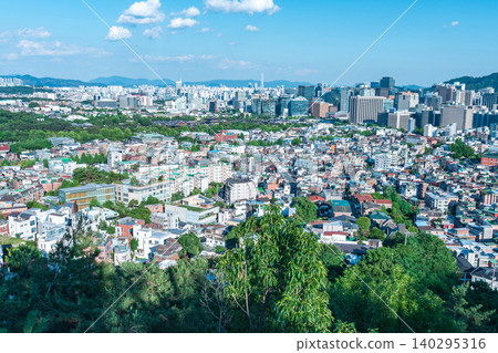 Panoramic view of downtown Seoul city skyline and Namsan Seoul Tower from Inwangsan Mountain on a clear summer day Panoramic view of downtown Seoul city skyline and Namsan Seoul Tower from Inwangsan Mountain on a clear summer day 140295316