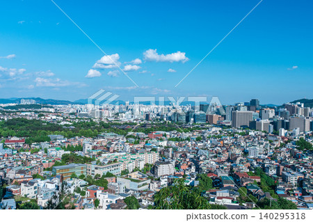 Panoramic view of downtown Seoul city skyline and Namsan Seoul Tower from Inwangsan Mountain on a clear summer day Panoramic view of downtown Seoul city skyline and Namsan Seoul Tower from Inwangsan Mountain on a clear summer day 140295318