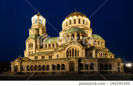 Alexander Nevski Cathedral in Sofia, Buglaria at night. Patriarchal cathedral of St. Alexander Nevsky in evening. Golden domes shining by spotlights Alexander Nevski Cathedral in Sofia, Buglaria at night. Patriarchal cathedral of St. Alexander Nevsky in evening. Golden domes shining by spotlights 140295389