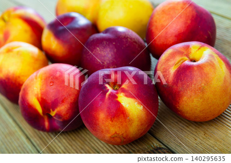 Fresh nectarine fruit served on table 140295635