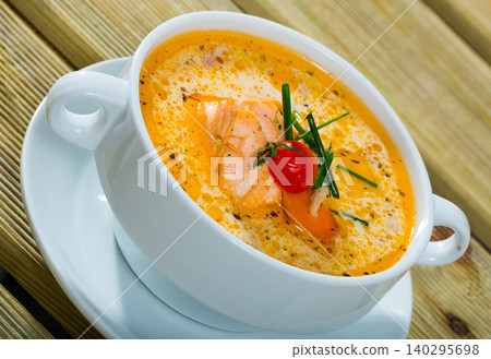 Norwegian creamy soup with salmon 140295698
