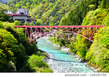 View of Unazuki Onsen, Shin-Yamahiko Bridge, and the Kurobe River area (Kurobe City, Toyama Prefecture) [May 2026] 140295709