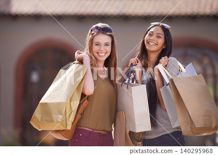 Women, friends and shopping bag for outdoor fashion with sale, discount and a happy portrait. Face of young people with smile, diversity and cool clothes, accessories or sunglasses in city for retail Women, friends and shopping bag for outdoor fashion with sale, discount and a happy portrait. Face of young people with smile, diversity and cool clothes, accessories or sunglasses in city for retail 140295968