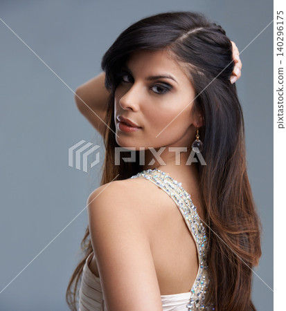 Fashion, beauty and portrait of woman in studio with confidence, glamour and luxury style. Attractive, aesthetic and person with stylish clothes, cosmetics and designer outfit on gray background Fashion, beauty and portrait of woman in studio with confidence, glamour and luxury style. Attractive, aesthetic and person with stylish clothes, cosmetics and designer outfit on gray background 140296175
