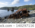 Burned SUV Wreck After Falling from Cliff. 140297116