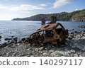 Burned SUV Wreck After Falling from Cliff. 140297117