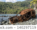 Burned SUV Wreck After Falling from Cliff. 140297119