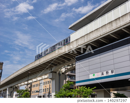 The exterior wall of the platform and the train at Takano Station on the Nippori-Toneri Liner. The exterior wall of the platform and the train at Takano Station on the Nippori-Toneri Liner. 140297297