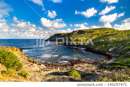 Beautiful sunny day view of the rugged coastline and turquoise waters at the Caravelle Peninsula nature reserve in Martinique. Beautiful sunny day view of the rugged coastline and turquoise waters at the Caravelle Peninsula nature reserve in Martinique. 140297471