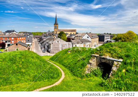 View of the historic star shaped fortifications and the town center of Rocroi in the Ardennes region of France View of the historic star shaped fortifications and the town center of Rocroi in the Ardennes region of France 140297522