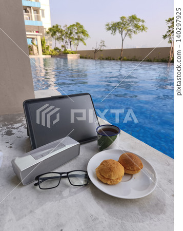 laptop, computer, remote work, digital nomad, freelancer, pool, swimming pool, poolside, edge, coffee, mug, breakfast, pastries, food, glasses, work from anywhere, vacation, holiday, travel, business, laptop, computer, remote work, digital nomad, freelancer, pool, swimming pool, poolside, edge, coffee, mug, breakfast, pastries, food, glasses, work from anywhere, vacation, holiday, travel, business, 140297925