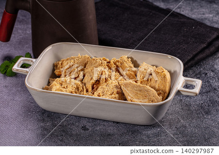 Traditional peanut Halva Sweet Slices in Ceramic Bowl Traditional peanut Halva Sweet Slices in Ceramic Bowl 140297987