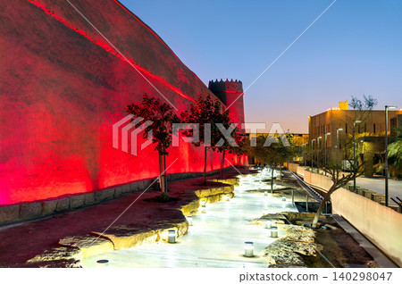 Masmak Fortress wall illuminated with red lights in Riyadh Masmak Fortress wall illuminated with red lights in Riyadh 140298047