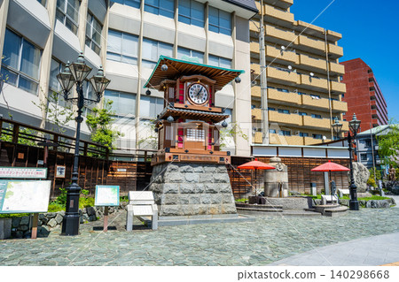 The Botchan Karakuri Clock and footbath in front of Dogo Onsen Station The Botchan Karakuri Clock and footbath in front of Dogo Onsen Station 140298668