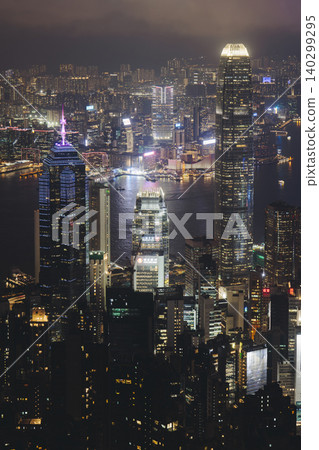 Hong Kong night evening view, China, seen from Victoria Peak observation deck, Lugard road lookout, with Hong Kong downtown skyscrapers and Kowloon island, illuminated city and Victoria Bay at night 140299295