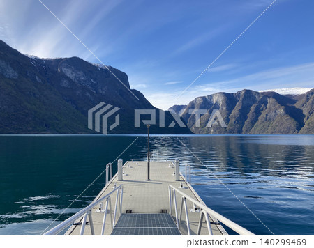 A tranquil pier floating on a fjord in Aurland, Norway. A tranquil pier floating on a fjord in Aurland, Norway. 140299469