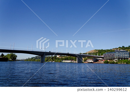 New modern Dvorecky Bridge spanning the Vltava River connecting Smichov and Podoli, designed exclusively for public transport, pedestrians and cyclists, Prague, Czech Republic New modern Dvorecky Bridge spanning the Vltava River connecting Smichov and Podoli, designed exclusively for public transport, pedestrians and cyclists, Prague, Czech Republic 140299612
