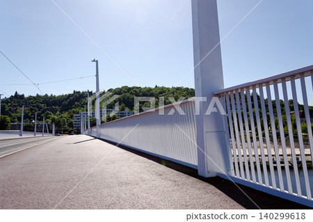 New modern Dvorecky Bridge spanning the Vltava River connecting Smichov and Podoli, designed exclusively for public transport, pedestrians and cyclists, Prague, Czech Republic New modern Dvorecky Bridge spanning the Vltava River connecting Smichov and Podoli, designed exclusively for public transport, pedestrians and cyclists, Prague, Czech Republic 140299618