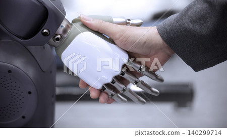 AI Robot shaking hands with man. Close up of human shaking hand with robotic arm. Symbolizing collaborate between people and artificial intelligence or AI. Automation robot innovate future technology AI Robot shaking hands with man. Close up of human shaking hand with robotic arm. Symbolizing collaborate between people and artificial intelligence or AI. Automation robot innovate future technology 140299714