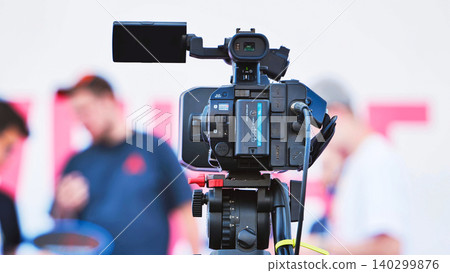 Professional video camera filming events in Moscow for broadcast news channels 140299876