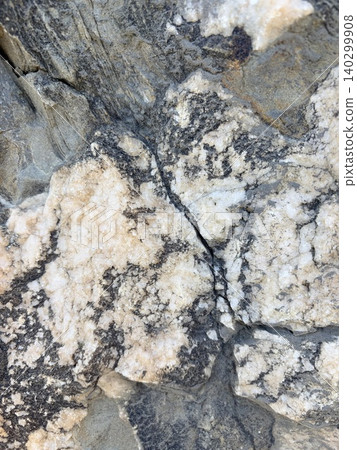 texture of natural gray and white granite. Rock surface texture of natural gray and white granite. Rock surface 140299908