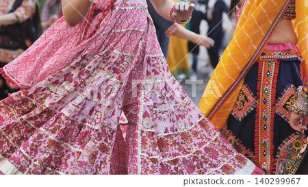 People dancing in traditional Indian clothing, celebrating Ganesh Chaturthi festival People dancing in traditional Indian clothing, celebrating Ganesh Chaturthi festival 140299967