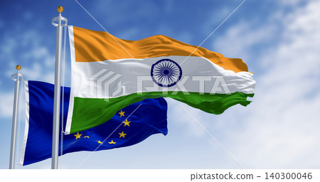 Flags of India and the European Union waving on a clear day Flags of India and the European Union waving on a clear day 140300046