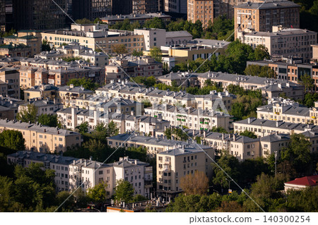 Moscow cityscape with dense urban residential housing in green district 140300254