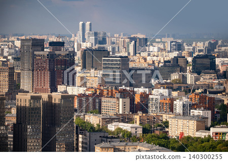 Moscow skyline with modern buildings and residential blocks under clear sky 140300255