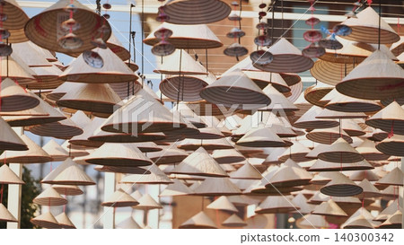 Traditional Vietnamese Conical Hats Hanging in Moscow During Vietnam Days Traditional Vietnamese Conical Hats Hanging in Moscow During Vietnam Days 140300342