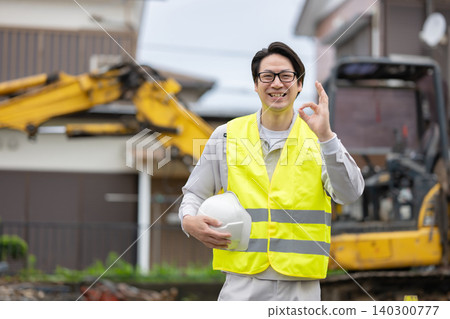 Worker making an OK sign Worker making an OK sign 140300777