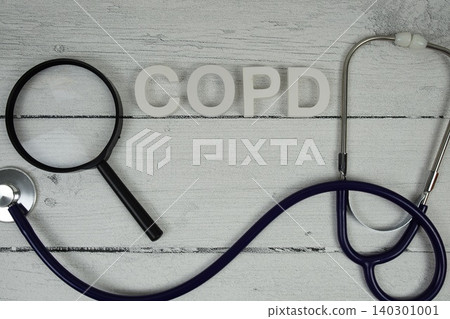 COPD Chronic Obstructive Pulmonary Disease text with Stethoscope on wooden background 140301001