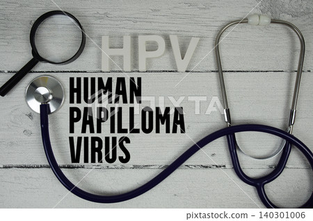 HPV Human papillomavirus text with Stethoscope on wooden background HPV Human papillomavirus text with Stethoscope on wooden background 140301006