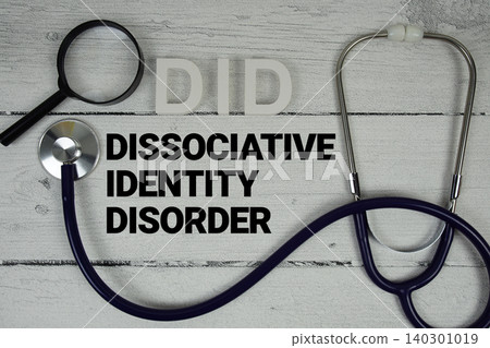 DID Dissociative Identity Disorder text with Stethoscope on wooden background DID Dissociative Identity Disorder text with Stethoscope on wooden background 140301019