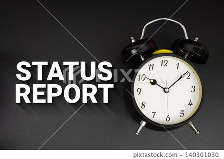 Status Report text with alarm clock on black background Status Report text with alarm clock on black background 140301030