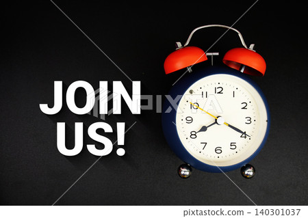 Join Us text with alarm clock on black background Join Us text with alarm clock on black background 140301037
