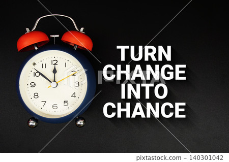 Turn Change Into Chance text with alarm clock on black background Turn Change Into Chance text with alarm clock on black background 140301042