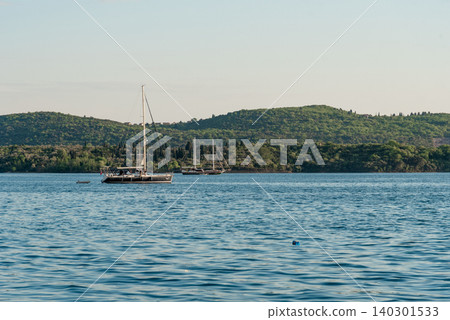 Yacht sails on water Adriatic Sea near city Tivat in Montenegro summer landscape Yacht sails on water Adriatic Sea near city Tivat in Montenegro summer landscape 140301533