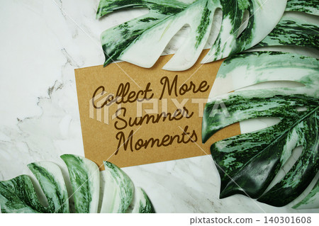 Collect More Summer Moments text with monstera leave on marble background Collect More Summer Moments text with monstera leave on marble background 140301608